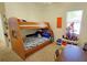 bedroom with bunk beds, desk, and playful decor at 7596 Palmer Glen Cir, Sarasota, FL 34240