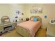 Charming bedroom with a vanity and a comfortable bed at 7596 Palmer Glen Cir, Sarasota, FL 34240