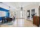 Bright and spacious entryway with tile flooring and view to dining area at 7596 Palmer Glen Cir, Sarasota, FL 34240