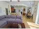 Open-concept Gathering room flows into kitchen and dining areas at 7596 Palmer Glen Cir, Sarasota, FL 34240