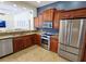 Modern kitchen with stainless steel appliances and granite countertops at 7596 Palmer Glen Cir, Sarasota, FL 34240