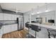 Kitchen with breakfast bar overlooking the living room at 8142 Coco Solo Ave, North Port, FL 34287