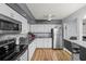 Spacious kitchen with stainless steel appliances and granite countertops at 8142 Coco Solo Ave, North Port, FL 34287