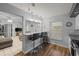Kitchen with breakfast bar and view into living room at 8142 Coco Solo Ave, North Port, FL 34287
