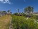 Scenic view of a canal, with homes and tropical foliage at 9008 Allapata Ln, Venice, FL 34293