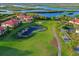 Golf course with water features and homes at 9435 Discovery Ter # 202D, Bradenton, FL 34212