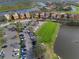 Community features a large parking lot and pond at 9435 Discovery Ter # 202D, Bradenton, FL 34212