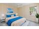 Virtually staged bedroom with a ceiling fan at 9435 Discovery Ter # 202D, Bradenton, FL 34212