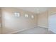 Bedroom with gray carpet, ceiling fan, and a closet at 9435 Discovery Ter # 202D, Bradenton, FL 34212