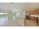 Modern kitchen features stainless steel appliances and light wood cabinetry at 9435 Discovery Ter # 202D, Bradenton, FL 34212