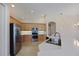 Kitchen with stainless steel appliances and light wood cabinets at 9435 Discovery Ter # 202D, Bradenton, FL 34212