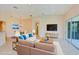 Spacious living room with access to patio at 9435 Discovery Ter # 202D, Bradenton, FL 34212