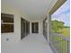 Spacious screened balcony overlooking lush greenery at 9435 Discovery Ter # 202D, Bradenton, FL 34212