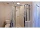 Clean bathroom with a shower stall and neutral colored tile at 1003 Fairwaycove Ln # 101, Bradenton, FL 34212