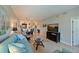 Open concept living area with view into dining area at 1003 Fairwaycove Ln # 101, Bradenton, FL 34212