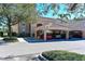 Condo building with covered parking spaces for residents at 1003 Fairwaycove Ln # 101, Bradenton, FL 34212