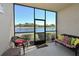 Relaxing screened porch overlooking a pond, perfect for enjoying the view at 1003 Fairwaycove Ln # 101, Bradenton, FL 34212