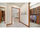 Large walk-in closet with custom shelving and ample storage at 10309 Riverbank Ter, Bradenton, FL 34212