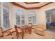 Bright game room with arched windows and game table at 10309 Riverbank Ter, Bradenton, FL 34212