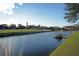 Picturesque waterfront view with homes and a bridge at 10309 Riverbank Ter, Bradenton, FL 34212