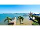 Scenic waterfront view with dock and boats at 117 10Th N St # 122, Bradenton Beach, FL 34217