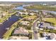 Aerial view of upscale community with waterfront homes at 11740 Rive Isle Run, Parrish, FL 34219