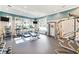 Modern fitness center with various cardio and strength training equipment at 11740 Rive Isle Run, Parrish, FL 34219