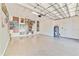 Spacious garage with epoxy floor and storage at 11740 Rive Isle Run, Parrish, FL 34219