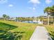 Scenic waterfront property with private dock and lush landscaping at 11740 Rive Isle Run, Parrish, FL 34219