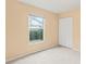 Peach colored bedroom with large window and closet at 1204 W 20Th Ave, Palmetto, FL 34221