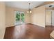 Dining room with wood floors and sliding glass doors at 1204 W 20Th Ave, Palmetto, FL 34221