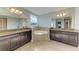 Double vanity bathroom with corner soaking tub and shower at 12941 Bliss Loop, Bradenton, FL 34211