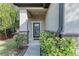 Front entry with glass door and stone accents at 12941 Bliss Loop, Bradenton, FL 34211