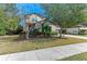 Two-story house with lush landscaping and sidewalk at 12941 Bliss Loop, Bradenton, FL 34211