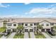 Aerial view of townhouses with attached garages and landscaped yards at 15127 Lyla Ter, Bradenton, FL 34211