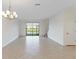 Spacious dining room with tile floors and sliding glass doors at 15127 Lyla Ter, Bradenton, FL 34211