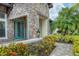 Landscaped front yard with walkway and stone accents at 16621 Berwick Ter, Lakewood Ranch, FL 34202