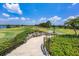 Stone steps leading down to the golf course at 16621 Berwick Ter, Lakewood Ranch, FL 34202