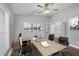 Bright home office with hardwood floors and built-in desk at 16621 Berwick Ter, Lakewood Ranch, FL 34202