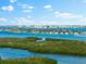 Panoramic view of waterfront homes and lush landscape at 2050 Benjamin Franklin Dr # B304, Sarasota, FL 34236