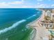 Aerial view of beachfront homes and ocean at 2050 Benjamin Franklin Dr # B304, Sarasota, FL 34236