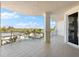 Spacious balcony with city views and outdoor grill at 2050 Benjamin Franklin Dr # B304, Sarasota, FL 34236