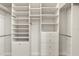 Large walk-in closet with ample shelving and hanging space at 2050 Benjamin Franklin Dr # B304, Sarasota, FL 34236