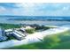 Aerial view of beachfront property and community at 2100 Benjamin Franklin Dr # 108, Sarasota, FL 34236