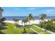 Stunning beachfront property with ocean view and lush lawn at 2100 Benjamin Franklin Dr # 108, Sarasota, FL 34236