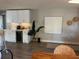 Home bar with white cabinets and wine cooler at 2510 Parma St, Sarasota, FL 34231