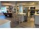 Open concept kitchen with island and stainless steel appliances at 2510 Parma St, Sarasota, FL 34231