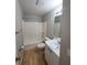 Clean bathroom with tub, toilet and vanity at 2537 Tishman Ave, North Port, FL 34286