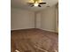 Large bedroom with plush carpeting at 2537 Tishman Ave, North Port, FL 34286