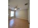 Bright bedroom with wood flooring and large window at 2537 Tishman Ave, North Port, FL 34286